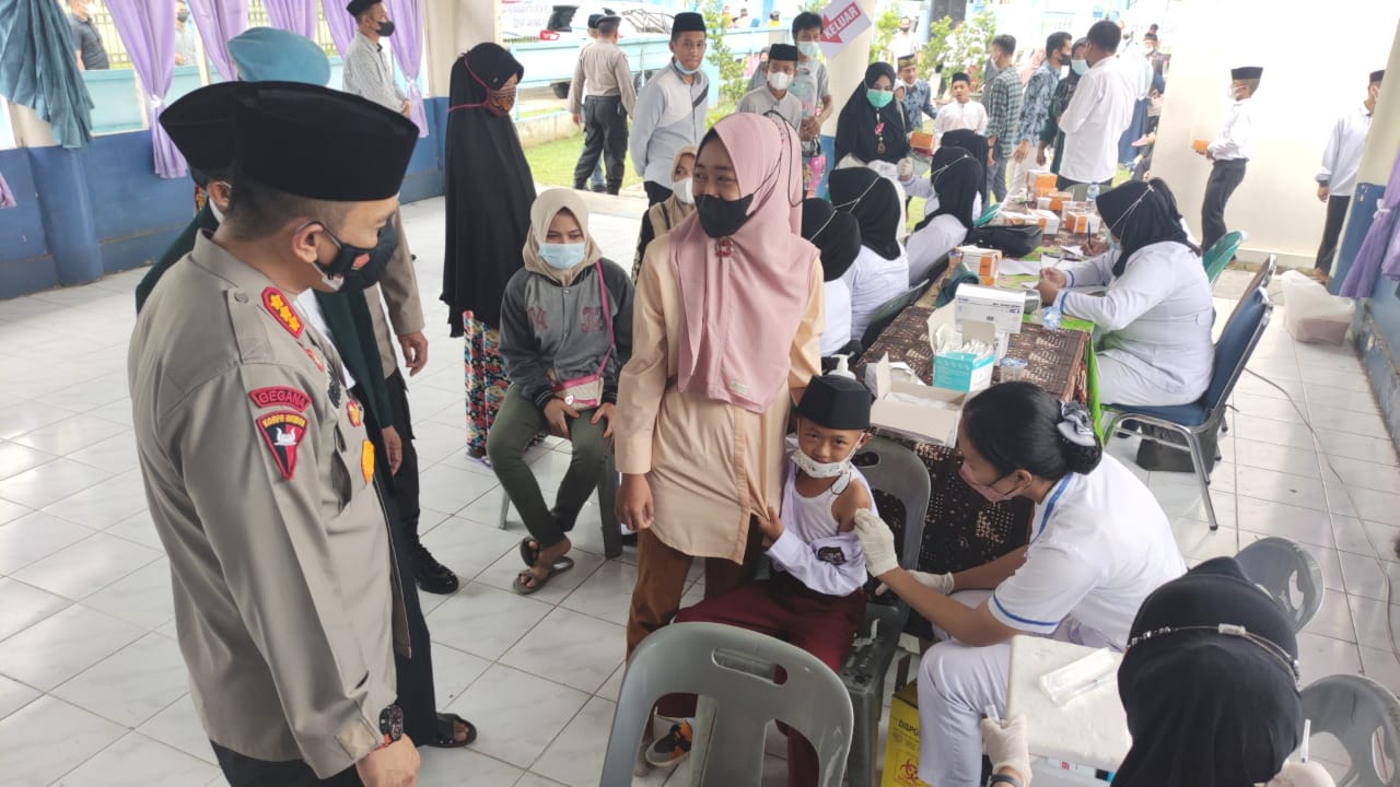 Peringati Isra Mi’raj Nabi Muhammad SAW, Polresta Deli Serdang Vaksinasi Massal Dan Bagi Sembako