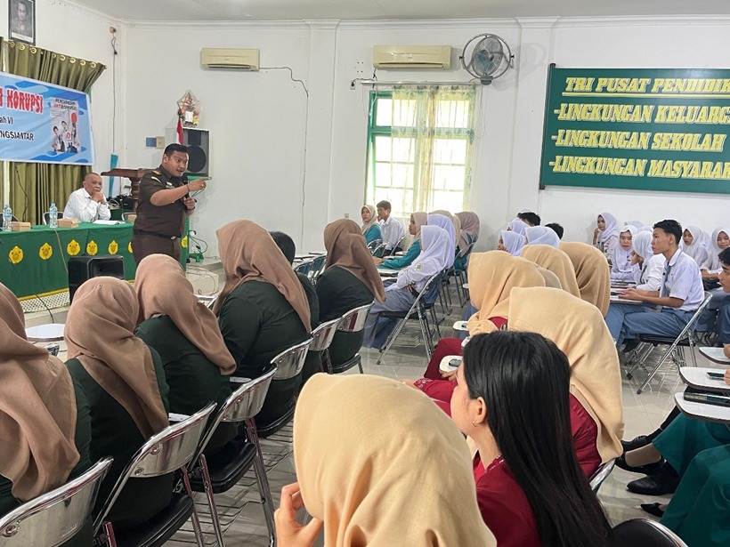 MENANAMKAN INTEGRITAS DENGAN SOSIALISASI PENDIDIKAN ANTI KORUPSI DI SMK1 SWASTA TAMAN SISWA PEMATANGSIANTAR