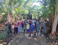 Satgas Yonif 121/MK Serahkan Fasilitas Air Bersih Kepada Masyarakat Perbatasan