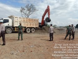 Polresta Deli Serdang Bersama TNI Amankan Jalur Lintas Truk Pengangkutan Material Bendungan Lau Simeme