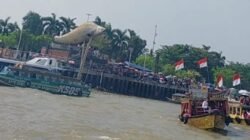 Menggelorakan Semangat Gotong Royong di Atas Sungai Musi: Pesona Tradisi Perahu Bidar yang Tak Tergerus Zaman